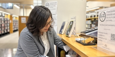 Librarian Shelves Read To Recovery Titles