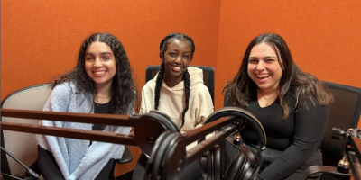 Voices Of 2 Blocks Podcast Cohosts With One Of Their Guests